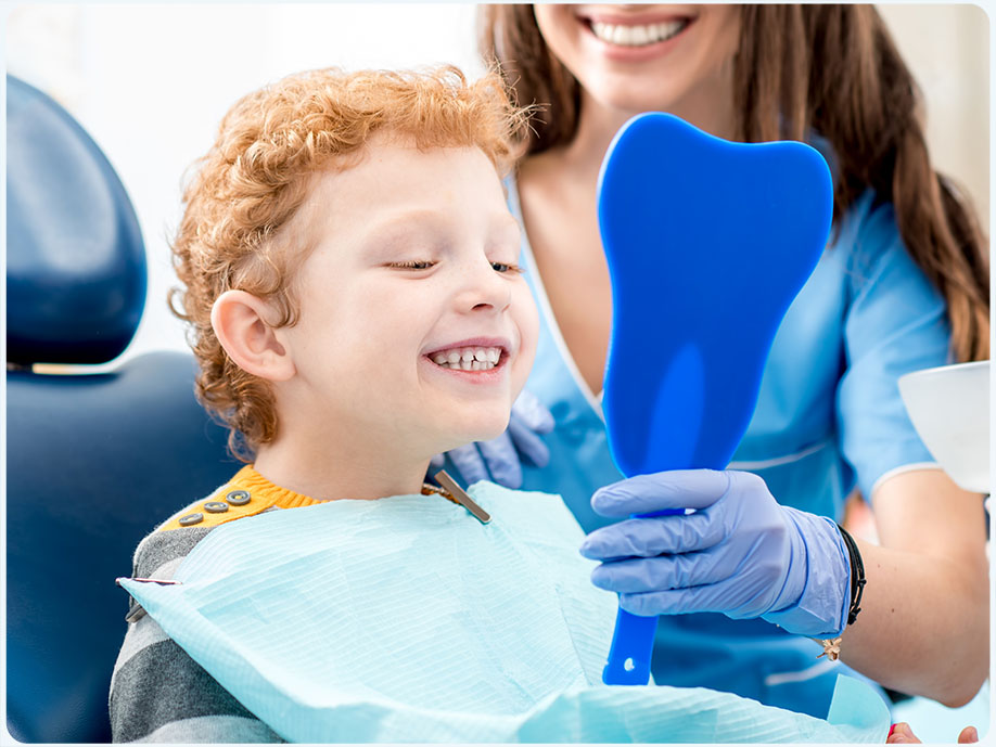 Boy with dentist at Radiant Dental Centre